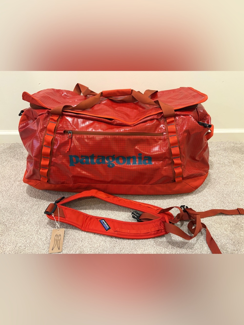 Patagonia black hole duffel – 100 L glossy “hot ember” – NWT!
